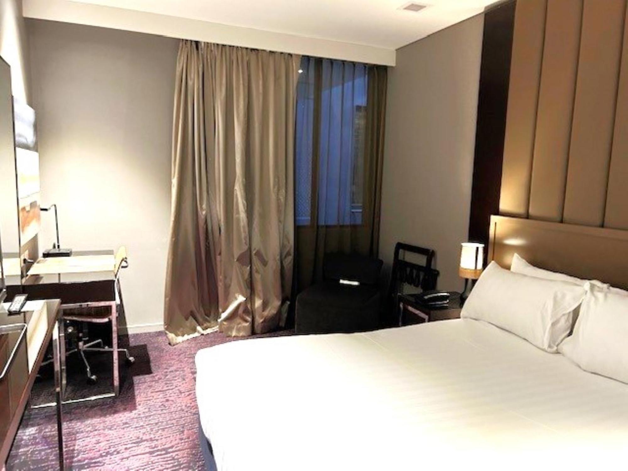 Gambaro Hotel Brisbane Kamer foto A room at the hotel